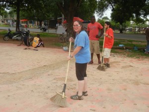 Crystal helping to demolish the old basketball court. Ghana.