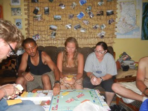 Crystal playing an epic game of Monopoly with some Peace Corps volunteers. Ghana.