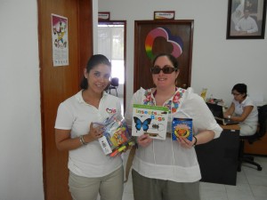 Crystal handing over the school supplies donation in Cozumel