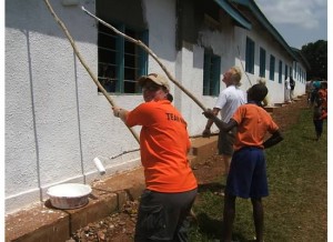 Crystal painting a school in Jinja, Uganda.